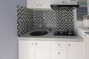 Best Deal Studio Bassura Apartment By Travelio