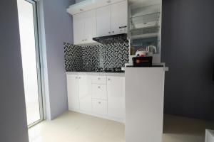 Best Deal Studio Bassura Apartment By Travelio