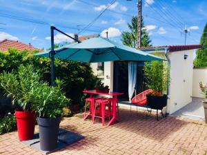 Appartements La Cuisine d'ete de BeaunAmour : photos des chambres