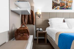 Hotels Kyriad Lyon Est Stadium Eurexpo Meyzieu : photos des chambres