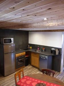 Appartements le Woody : photos des chambres