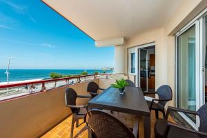 Appartements Premiere ligne de plage, face a la mer : photos des chambres