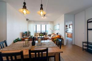 Appartements Premiere ligne de plage, face a la mer : photos des chambres