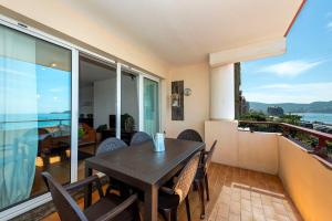 Appartements Premiere ligne de plage, face a la mer : photos des chambres