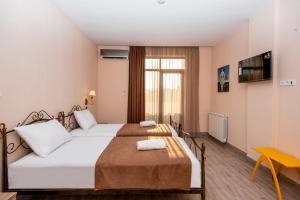 Tonusi Luxe Hotel in the Historic City Center