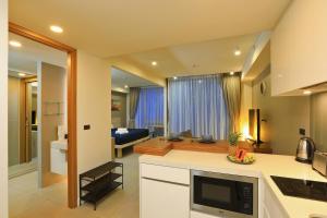 Oceanstone by Holy Cow, studio, next building view