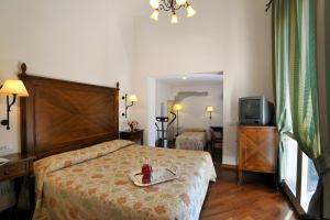 Standard Triple Room room in Hotel Fortuna