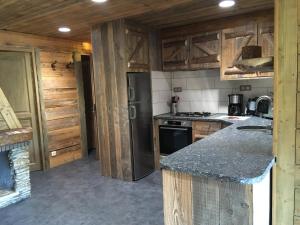 Appart'hotels Le Couaroge Chalets et Appartements : photos des chambres