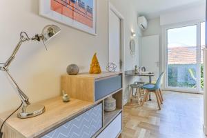 Appartements Maison Bianchi - 45 Berlioz : photos des chambres