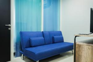 Modern Living 1BR @Atlanta Residences Apartment With City View By Travelio