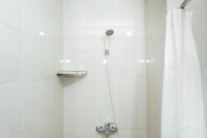 Homey 1BR at Signature Park Grande Apartment By Travelio