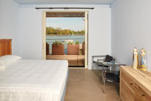 Double or Twin Room with Balcony and Lagoon View room in Boutique Hotel Oche Selvatiche