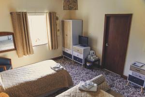 Family Room (2 Adults + 1 Child) room in Abbey Grange Hotel