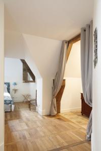 Maisons de vacances Le Domaine de Ravenoville - Pierres d'Histoire : photos des chambres