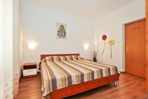 Three-Bedroom Apartment with Balcony room in Apartments with a parking space Vrsar Porec - 14164