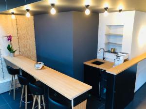 Maisons de vacances Maison d'architecte en plein coeur d'Honfleur avec bain nordique : photos des chambres