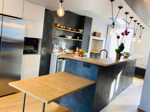 Maisons de vacances Maison d'architecte en plein coeur d'Honfleur avec bain nordique : photos des chambres