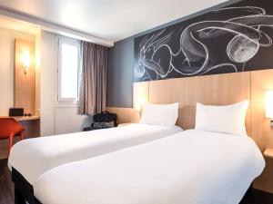 Hotels ibis Saint-Denis Stade Ouest : photos des chambres