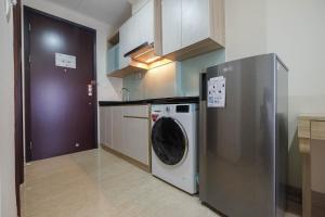 Simply Furnished Studio at Menteng Park Apartment By Travelio