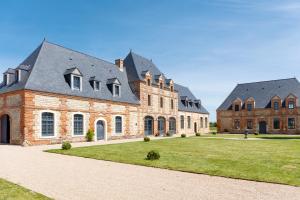 Maisons de vacances Le Domaine de Ravenoville - Pierres d'Histoire : photos des chambres