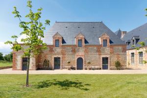 Maisons de vacances Le Domaine de Ravenoville - Pierres d'Histoire : photos des chambres