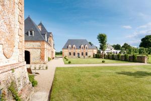 Maisons de vacances Le Domaine de Ravenoville - Pierres d'Histoire : photos des chambres