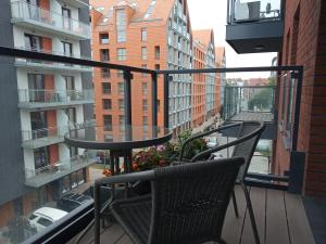 Przytulny apartament blisko Motławy i Neptuna z miejscem w garażu gratis