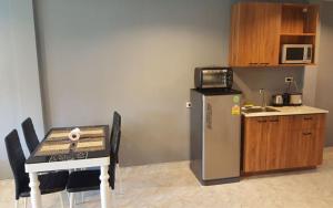 Oasis Apartments & Bar