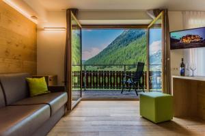 Quadruple Room with Balcony room in Sport Hotel