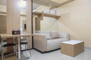 Spacious 1BR at The Oasis Cikarang Apartment By Travelio