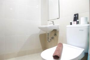 Spacious 1BR at The Oasis Cikarang Apartment By Travelio