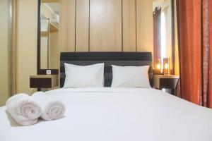 Spacious 1BR at The Oasis Cikarang Apartment By Travelio