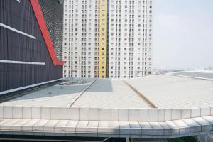 Spacious 2BR Green Bay Pluit Apartment By Travelio