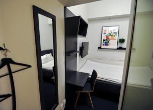 Standard Double Room without Window room in Moment Hotels