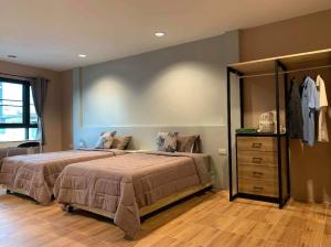 Phòng Hai Giường Đơn Loại Sang (Deluxe Twin Room)