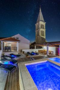 Luxury Villa David with a private boat, heated pool, jacuzzi and sauna