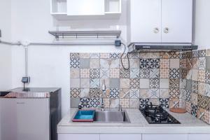 New Furnished Studio Apartment at Woodland Park Residence By Travelio