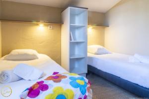 Villages vacances Les Garrigues de la Vallee des Baux : photos des chambres