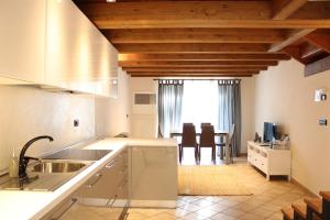 LAtelier du Temps - Les Greniers Appartements