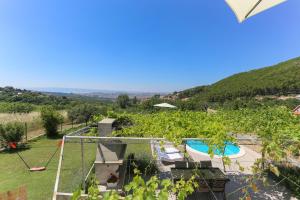 Holiday Home Rupotina with a large yard, pool and a beautiful view