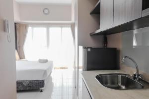 Relaxing and Homey Studio Casa De Parco Apartment By Travelio