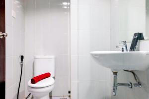 Homey Studio at Casa De Parco Apartment By Travelio