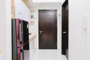 Homey Studio at Casa De Parco Apartment By Travelio