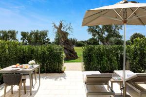 Junior Suite Deluxe con Terrazza e Giardino