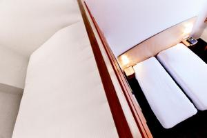 Hotels Hotel Restaurant Kyriad Mulhouse Nord Illzach : Chambre Triple avec 3 Lits Simples
