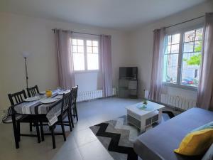 Appartements Au 36, Les Apparts Hotel Joigny : photos des chambres