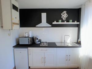 Appartements Au 36, Les Apparts Hotel Joigny : photos des chambres