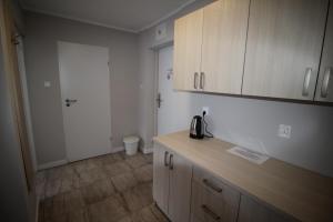 Pod Kominem Pokoje i Apartamenty