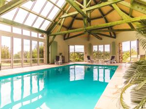 Maisons de vacances Chic holiday home with pool : photos des chambres
