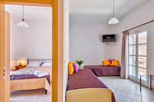 Ethrionplus two rooms apartments balconies 100 m from the port Syros Greece